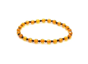 Двуцветна гривна фасетиран кехлибар